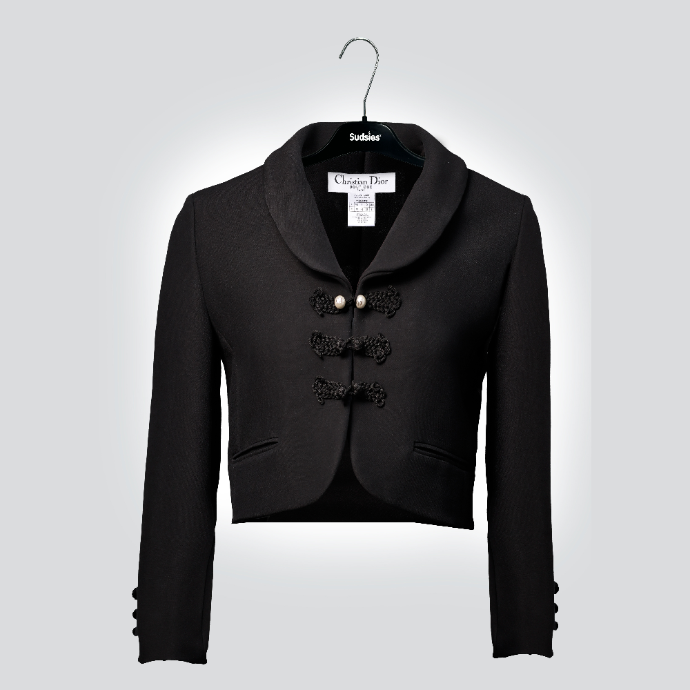 Black Christian Dior cropped blazer with braided toggle closures on a Sudsies hanger.